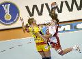 Hungarie's Orsolya Verten (R) tries to score despite Romania's Adriana Nicole Olteanu-Nechita (L) du